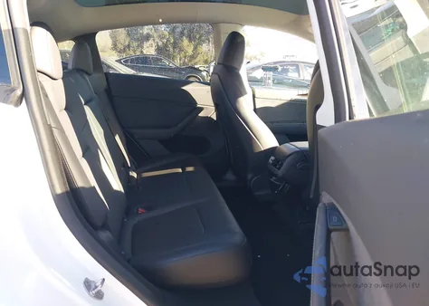 2023 Tesla Model Y Awd/Long Range Dual Motor All-Wheel Drive z USA, uszkodzony, nr VIN 7SAYGDEE9PA183212